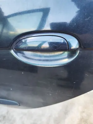 Foto de MANETA EXTERIOR TRASERA IZQUIERDA RENAULT SCENIC I (JA...) 1.9 dCi Diesel CAT (102 CV / 75 KW) referencia 7700433075