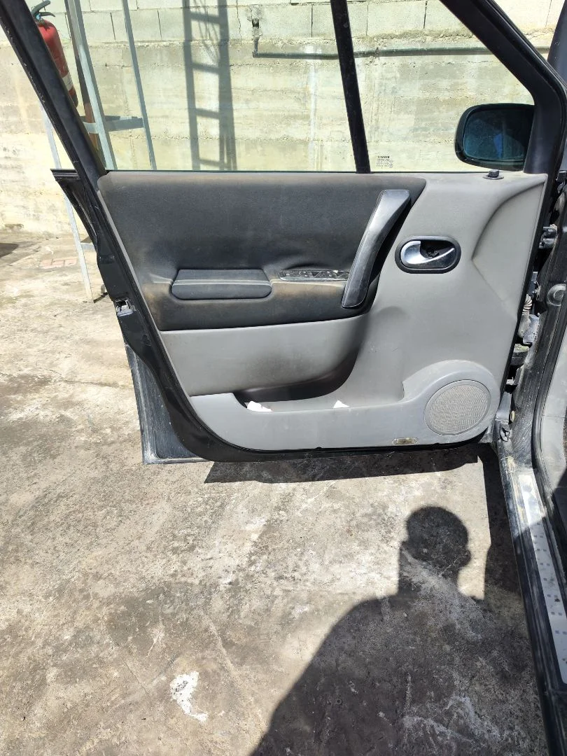 Foto de GUARNECIDO PUERTA DELANTERA IZQUIERDA RENAULT SCENIC II (JM) 1.9 dCi Diesel (120 CV / 88 KW) referencia 7701056912