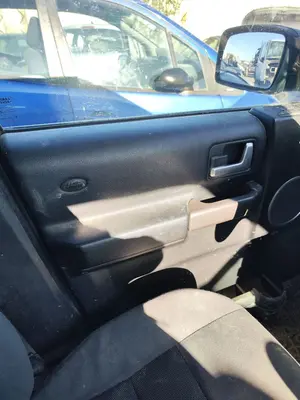 Foto de GUARNECIDO PUERTA DELANTERA IZQUIERDA LAND ROVER DISCOVERY 2.7 Td V6 CAT (190 CV / 140 KW) referencia VBA500070