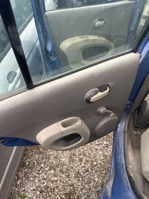Foto de GUARNECIDO PUERTA TRASERA IZQUIERDA NISSAN MICRA (K12E) 1.2 CAT (65 CV / 48 KW) referencia 82901AX122