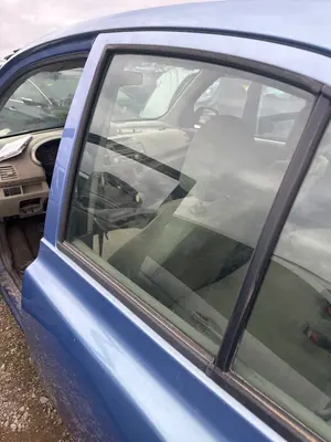 Foto de LUNA TRASERA IZQUIERDA NISSAN MICRA (K12E) 1.2 CAT (65 CV / 48 KW) referencia 82301AX105