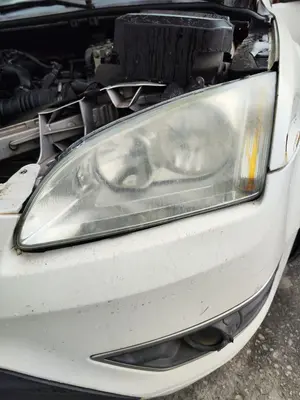 Foto de FARO IZQUIERDO FORD FOCUS BERLINA (CAP) 1.6 TDCi CAT (90 CV / 66 KW) referencia 1480990