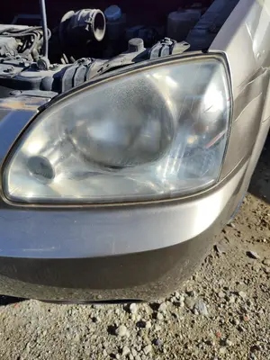 Foto de FARO IZQUIERDO KIA CARENS (RS) 1.8 16V CAT (126 CV / 93 KW) referencia 0K2JA51040