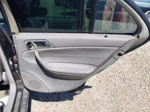 Foto de GUARNECIDO PUERTA TRASERA DERECHA MERCEDES-BENZ CLASE C (BM 203) BERLINA 2.2 CDI CAT (116 CV / 85 KW) referencia A2037304870 9C32