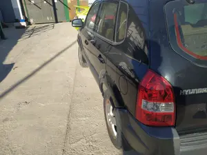 Foto de PUERTA TRASERA IZQUIERDA HYUNDAI TUCSON (JM) 2.0 CRDi CAT (113 CV / 83 KW) referencia 77003-2E020