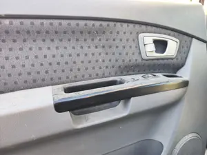 Foto de MANETA INTERIOR TRASERA IZQUIERDA KIA CARENS (RS) 1.8 16V CAT (126 CV / 93 KW) referencia 0K2FA59330FKZ