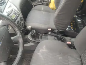 Foto de CONSOLA CENTRAL FORD FOCUS BERLINA (CAK) 1.8 TDDI Turbodiesel CAT (90 CV / 66 KW)