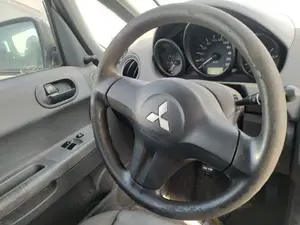 Foto de AIRBAG DELANTERO IZQUIERDO MITSUBISHI COLT CZ3 BERL. 5 (Z30A) 1.1 CAT (75 CV / 55 KW)