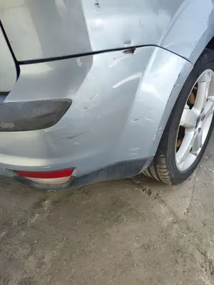 Foto de PARAGOLPES TRASERO FORD FOCUS BERLINA (CAP) 1.8 TDCi Turbodiesel CAT (116 CV / 85 KW) referencia 1336747 foto 2