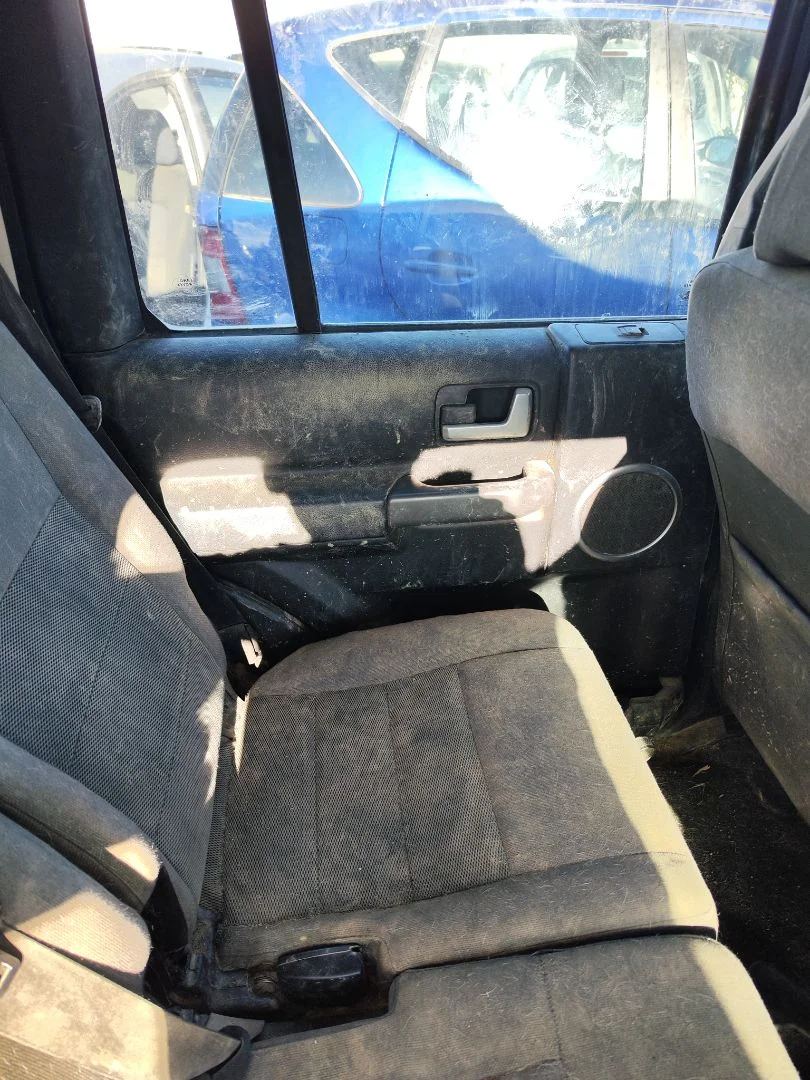 Foto de GUARNECIDO PUERTA TRASERA IZQUIERDA LAND ROVER DISCOVERY 2.7 Td V6 CAT (190 CV / 140 KW) referencia VBA500090
