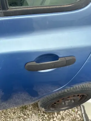 Foto de MANETA EXTERIOR TRASERA IZQUIERDA NISSAN MICRA (K12E) 1.2 CAT (65 CV / 48 KW) referencia 80640AX62B